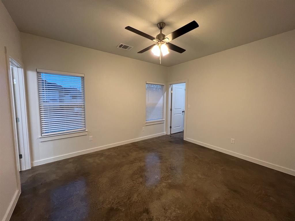 402 North Elliott Avenue Sherman, TX 75090 - Photo 6 of 19 a view of an empty room with a window