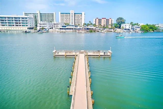 a view of a water and a lawn chairs