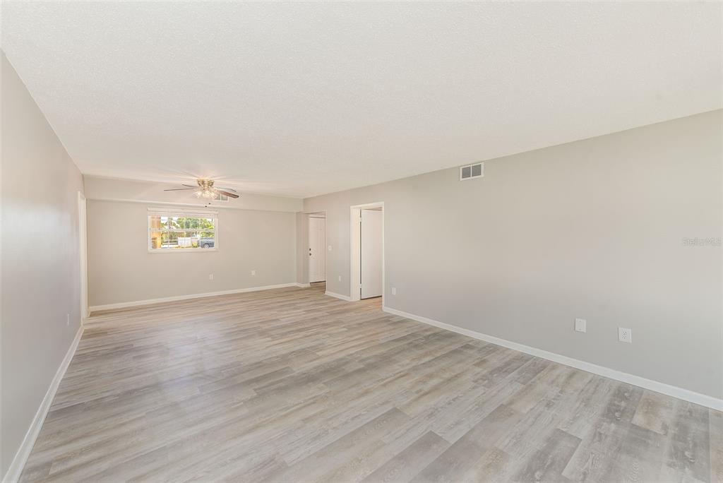 10280 Imperial Point Drive West, Unit 7 Largo, FL 33774 - Photo 22 of 51 a view of an empty room and a window