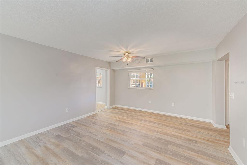10280 Imperial Point Drive West, Unit 7 Largo, FL 33774 - Photo 24 of 51 a view of an empty room with a window