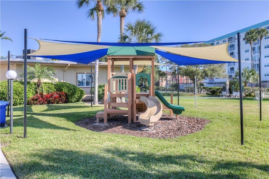 10280 Imperial Point Drive West, Unit 7 Largo, FL 33774 - Photo 44 of 51 a view of outdoor space yard and patio