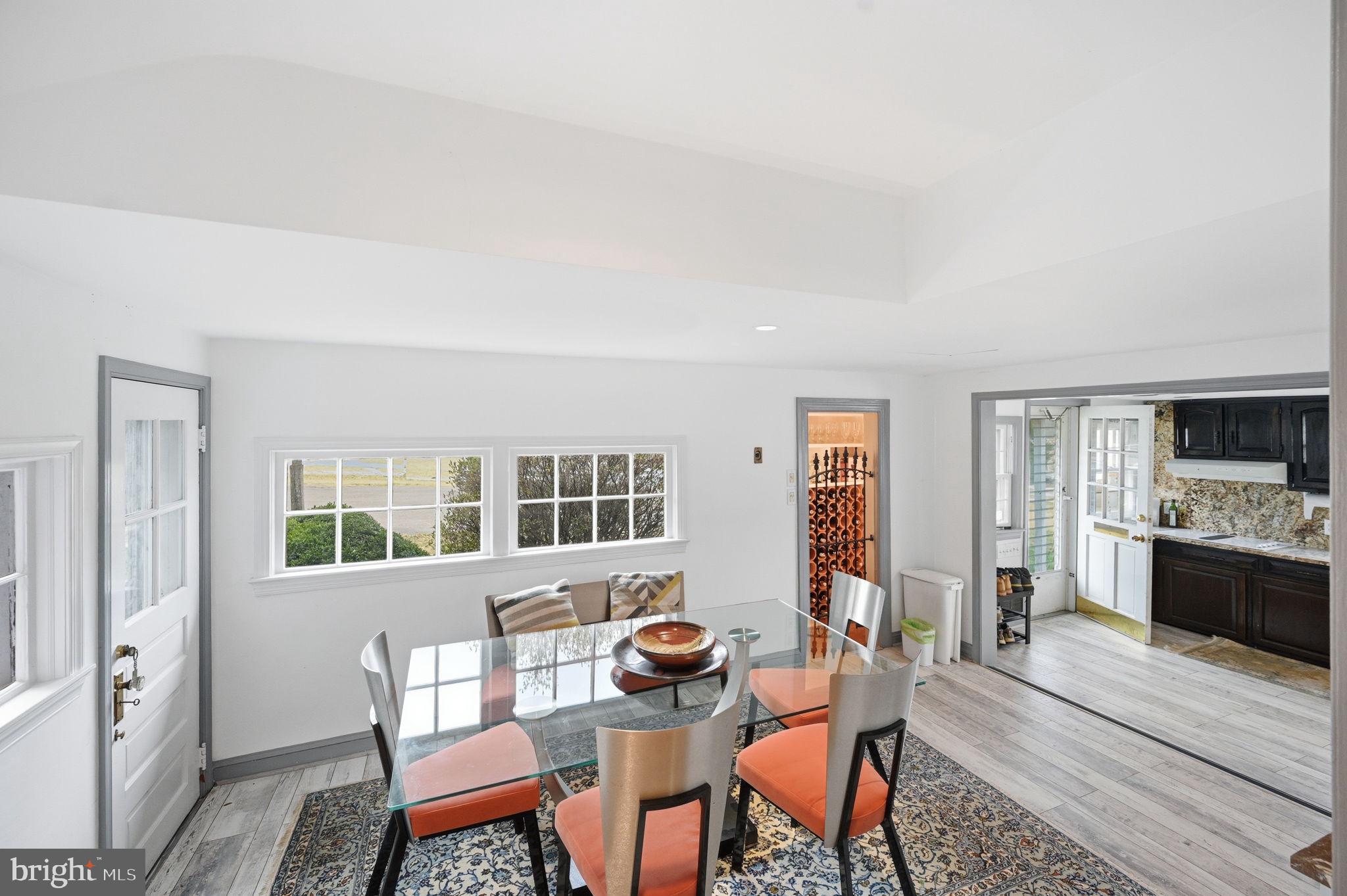11641 Glen Road Potomac, MD 20854 - Photo 15 of 40 a view of a dining room with furniture window and wooden floor