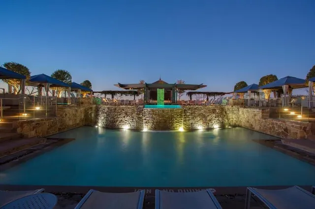 a view of a city with lawn chairs