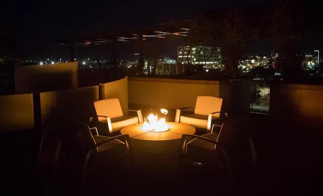an aerial view of a house with sign board