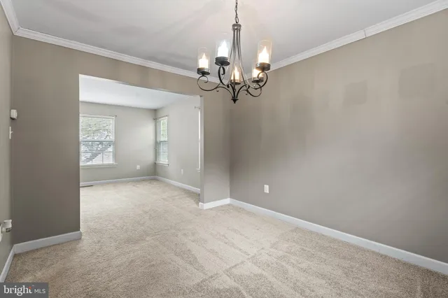 a kitchen with a sink stove and refrigerator