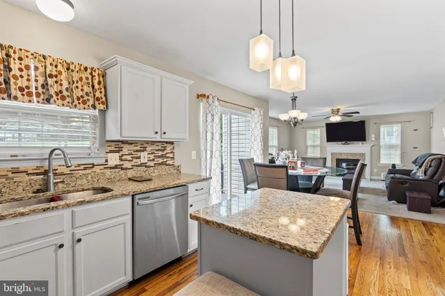 a dining table chair and a chandelier
