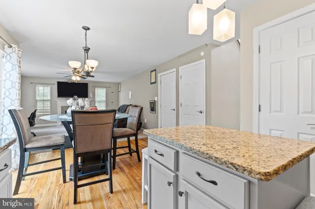 a view of a livingroom with furniture window and wooden floor