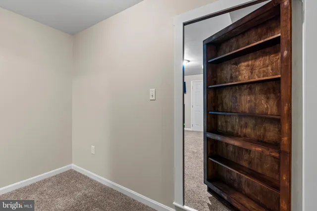 a bathroom with a bathtub and a toilet