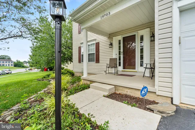 a house view with a sitting space and garden view