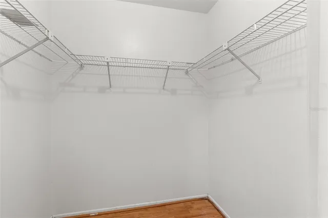 a room with furniture and a ceiling fan