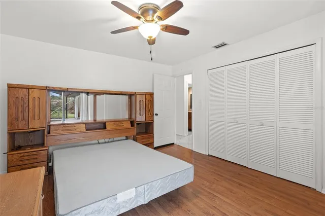 a view of swimming pool with a patio and yard