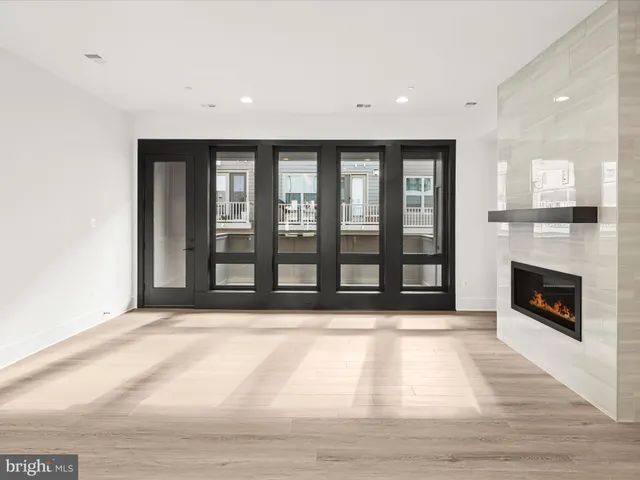 a kitchen with a sink and a stove top oven