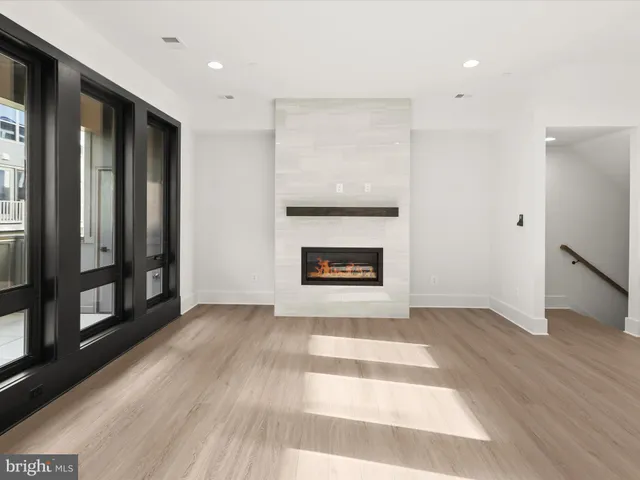 a kitchen with stainless steel appliances granite countertop a sink and cabinets