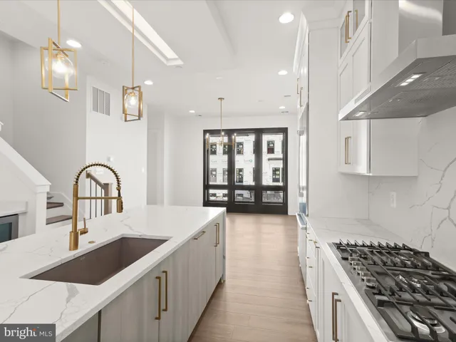 a view of a hallway with stairs