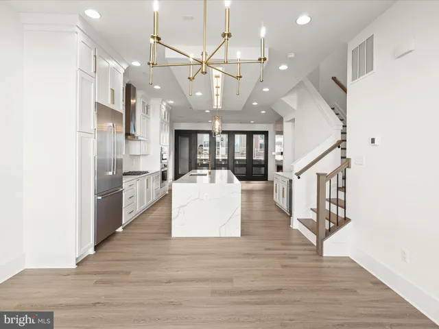a bathroom with a sink double vanity and shower