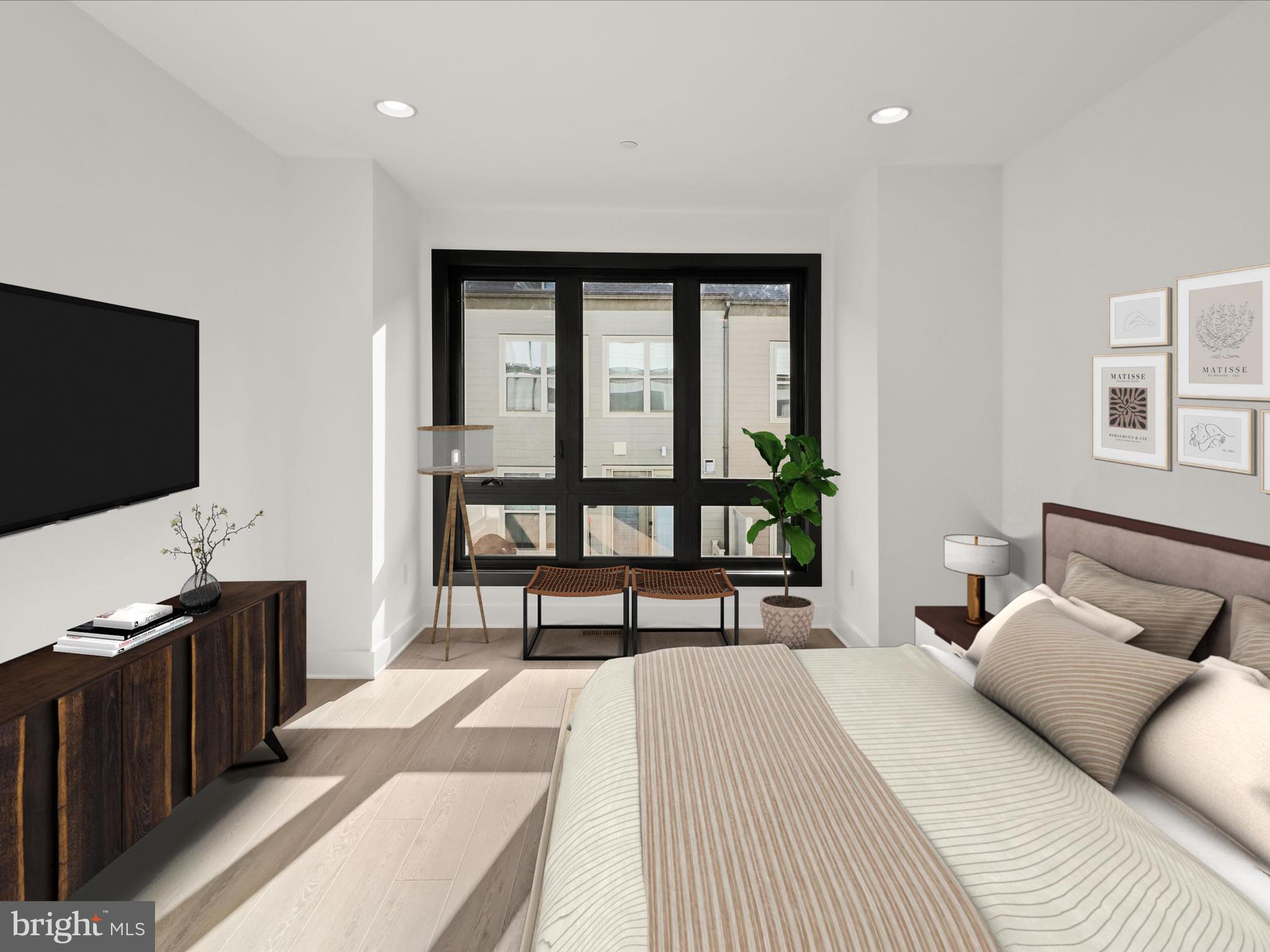 14920 Dispatch Street Rockville, MD 20850 - Photo 33 of 85 a bedroom with a bed and a flat screen tv