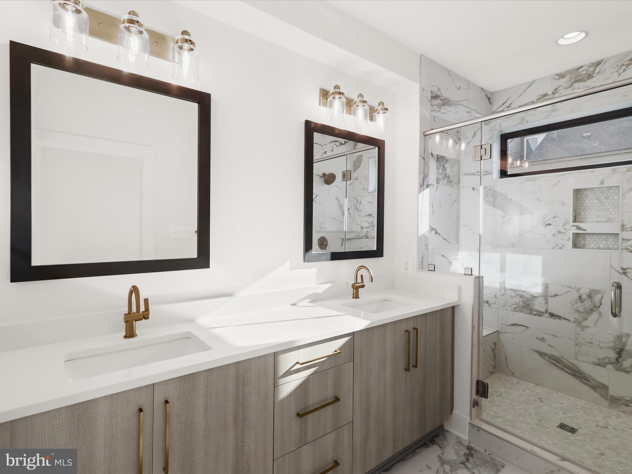 14920 Dispatch Street Rockville, MD 20850 - Photo 41 of 85 a bathroom with a granite countertop sink mirror and double