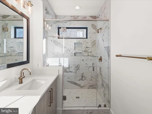 a view of a large building with a city street