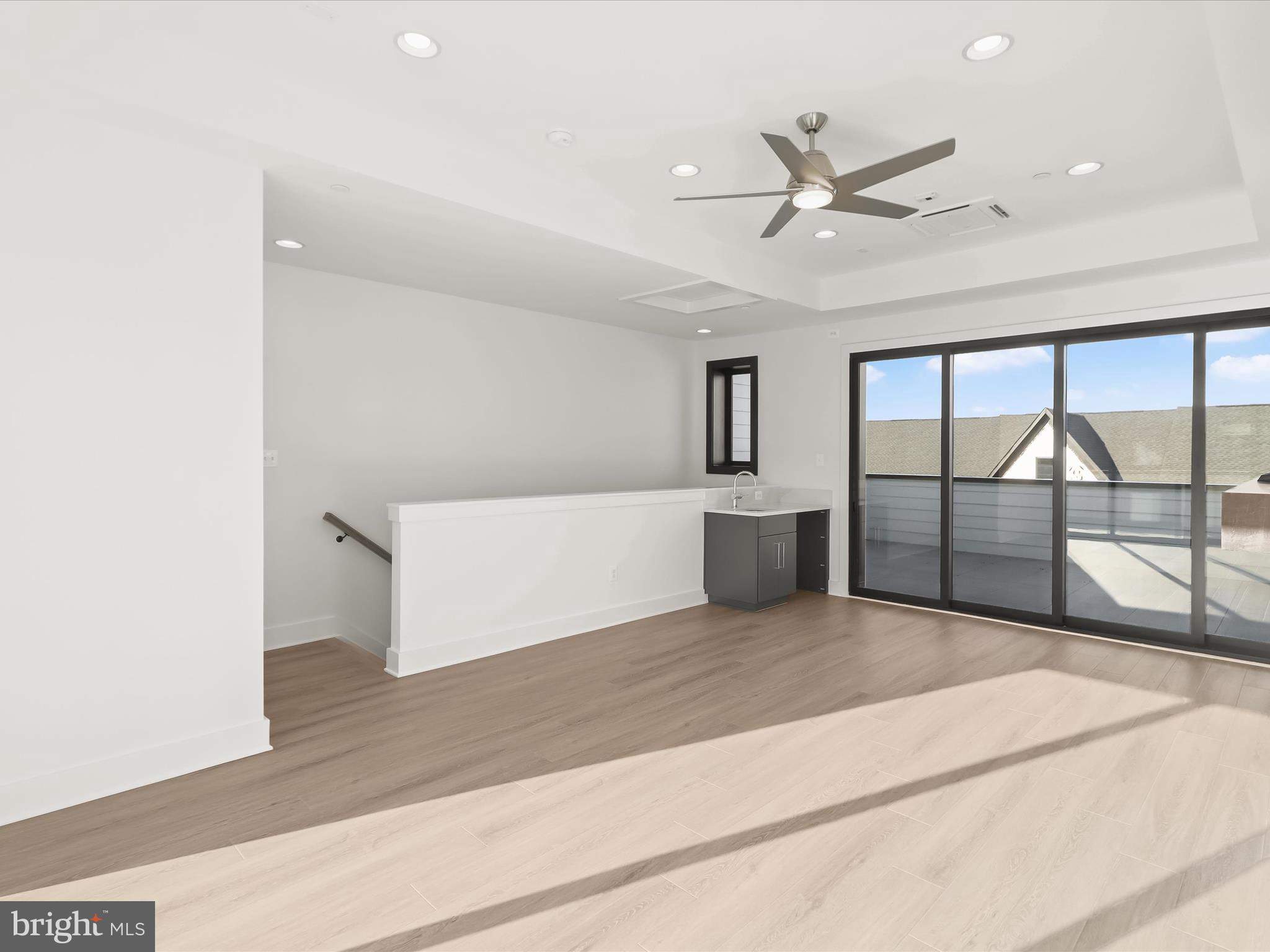 14920 Dispatch Street Rockville, MD 20850 - Photo 57 of 85 a living room with a large window