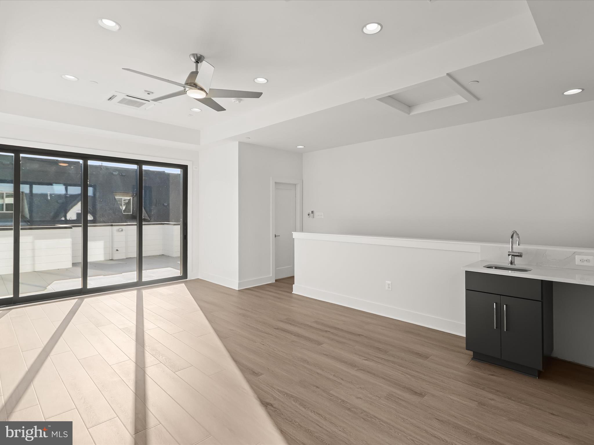 14920 Dispatch Street Rockville, MD 20850 - Photo 60 of 85 a view of a room with a sink and cabinet