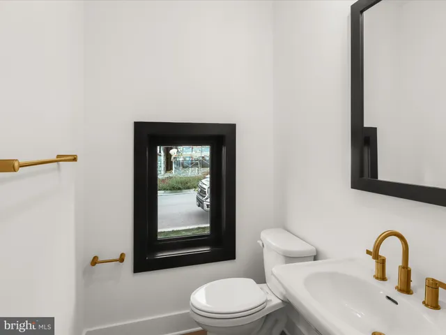 a living room with furniture fireplace and flat screen tv