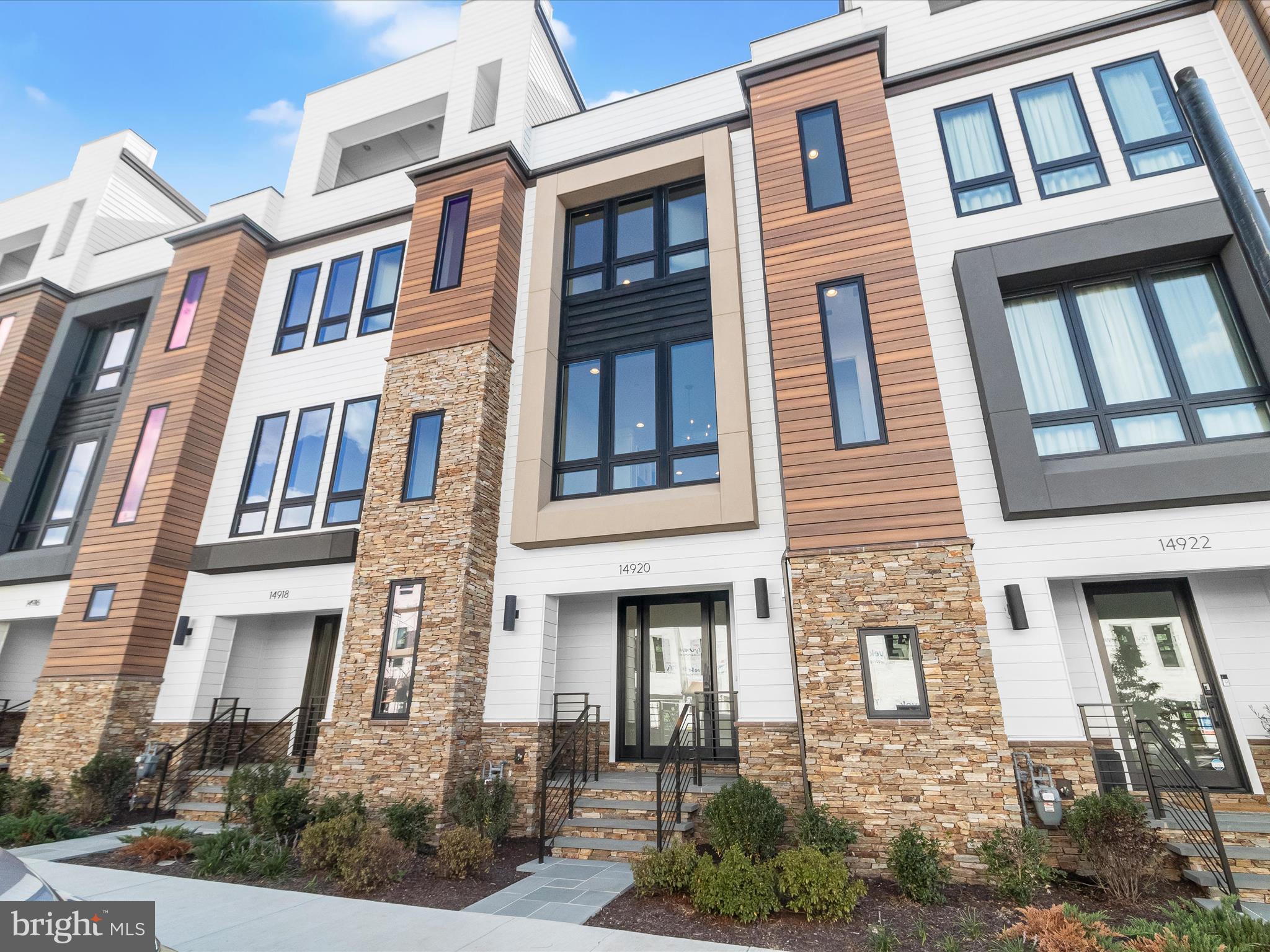 14920 Dispatch Street Rockville, MD 20850 - Photo 78 of 85 a front view of a multi story residential apartment building