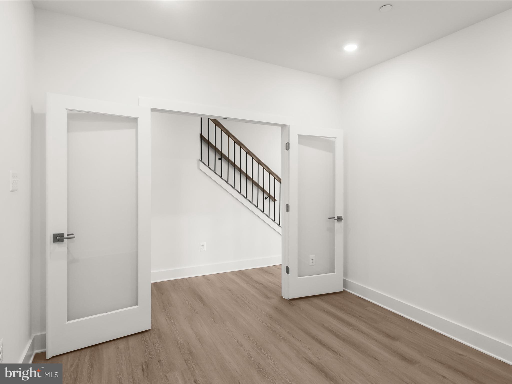 14920 Dispatch Street Rockville, MD 20850 - Photo 10 of 85 a view of an entryway with wooden floor