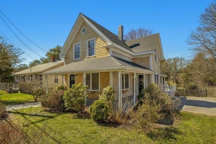 39 Onset Avenue Wareham, MA 02532 - Photo 2 of 30 a front view of house with yard and green space
