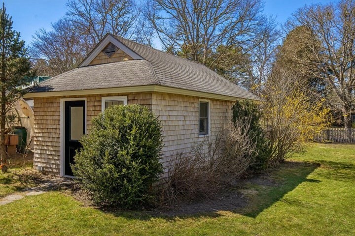 39 Onset Avenue Wareham, MA 02532 - Photo 24 of 30 a front view of a house with garden