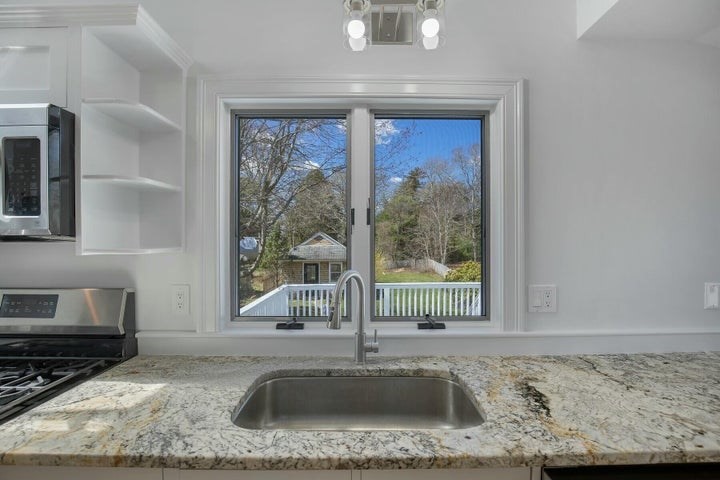 39 Onset Avenue Wareham, MA 02532 - Photo 7 of 30 a kitchen with a sink and a large window