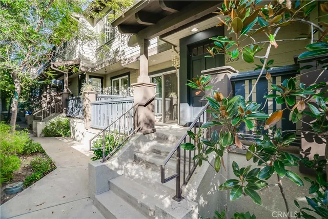 a view of an chairs and table in the patio