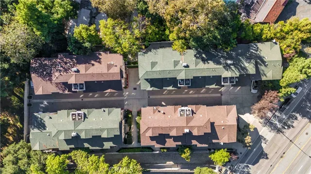 an aerial view of a city with lots of residential buildings