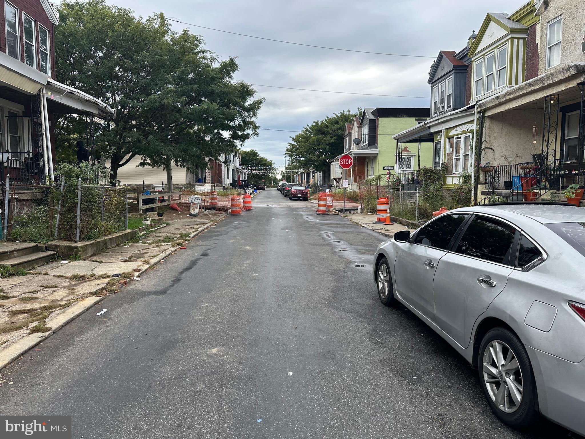 6034 Regent Street Philadelphia, PA 19142 - Photo 2 of 2 a view of street with parked cars
