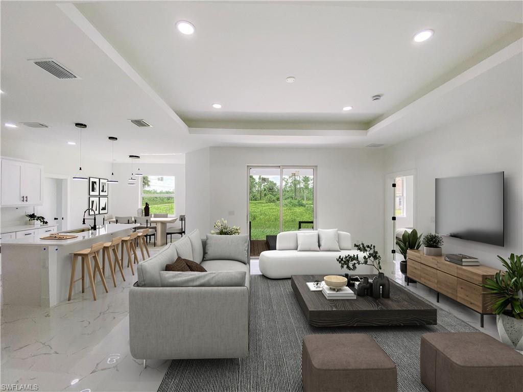 241 Novia Lehigh Acres, FL 33974 - Photo 11 of 28 a living room with furniture and a large window