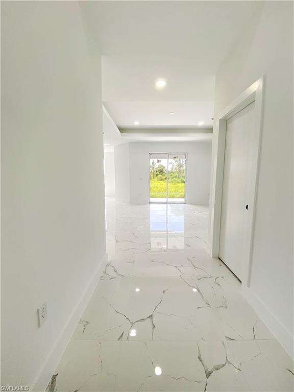 241 Novia Lehigh Acres, FL 33974 - Photo 3 of 28 a view of an empty room and a window