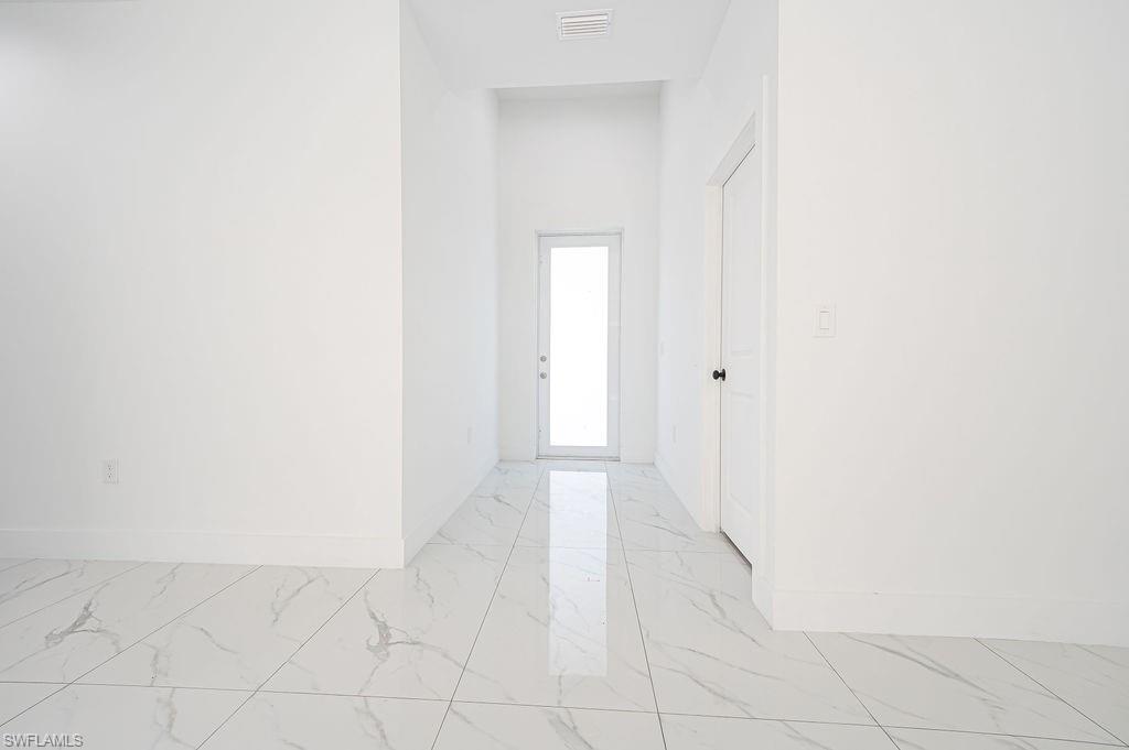 241 Novia Lehigh Acres, FL 33974 - Photo 9 of 28 a view of an empty room