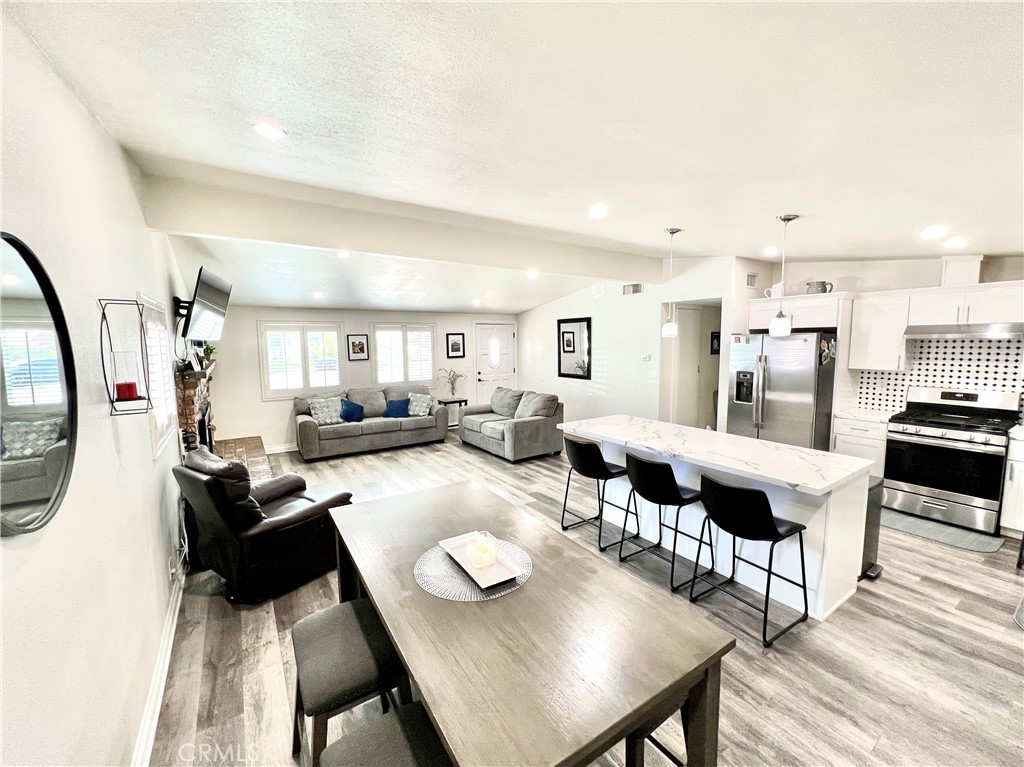 11561 Cherrylee Drive El Monte, CA 91732 - Photo 4 of 8 a living room with furniture and a table