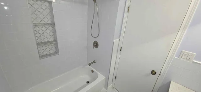 a bathroom with a bathtub