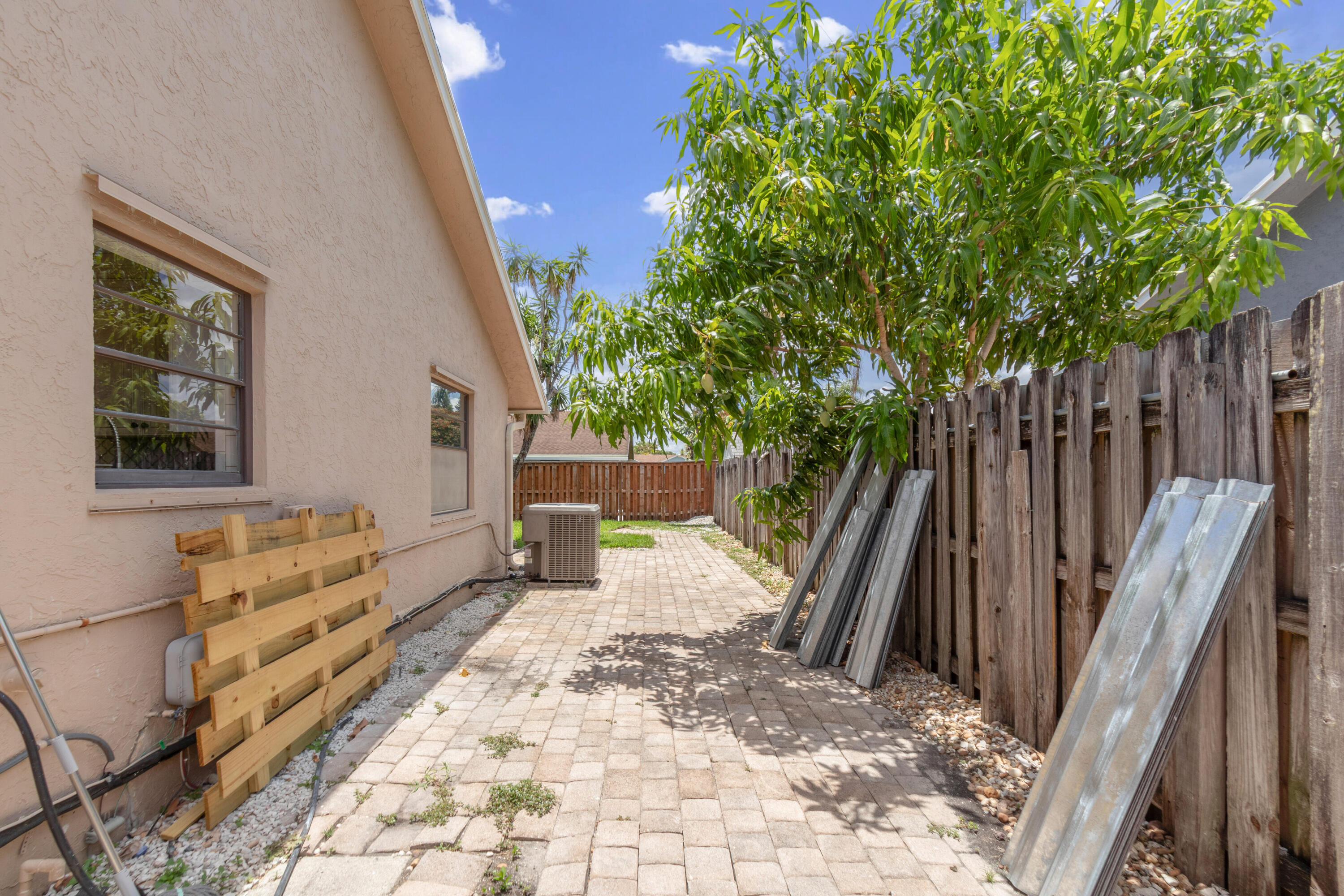 23089 Southwest 55th Avenue Boca Raton, FL 33433 - Photo 24 of 29 a view of entryway with wooden floor