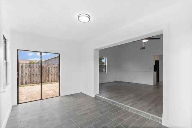 an empty room with windows