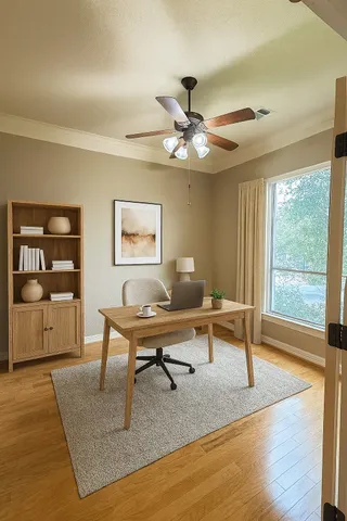 a living room with furniture a rug and a window