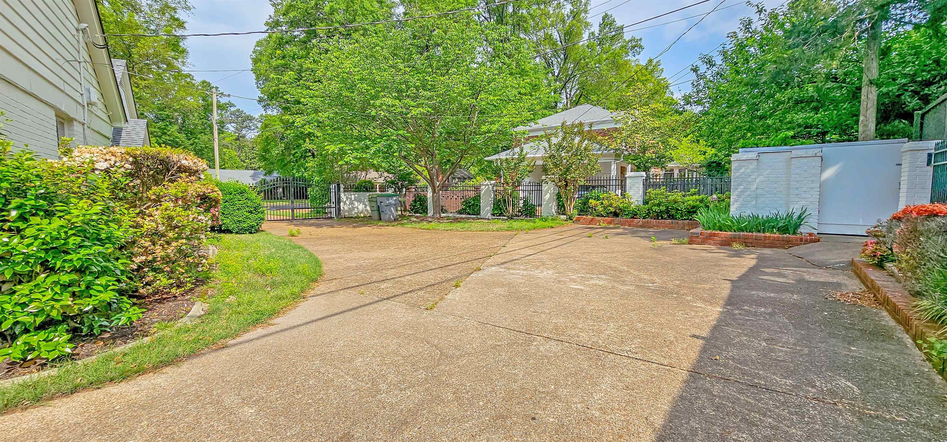 154 Perkins Extension Memphis, TN 38117 - Photo 36 of 40 a pathway with a patio