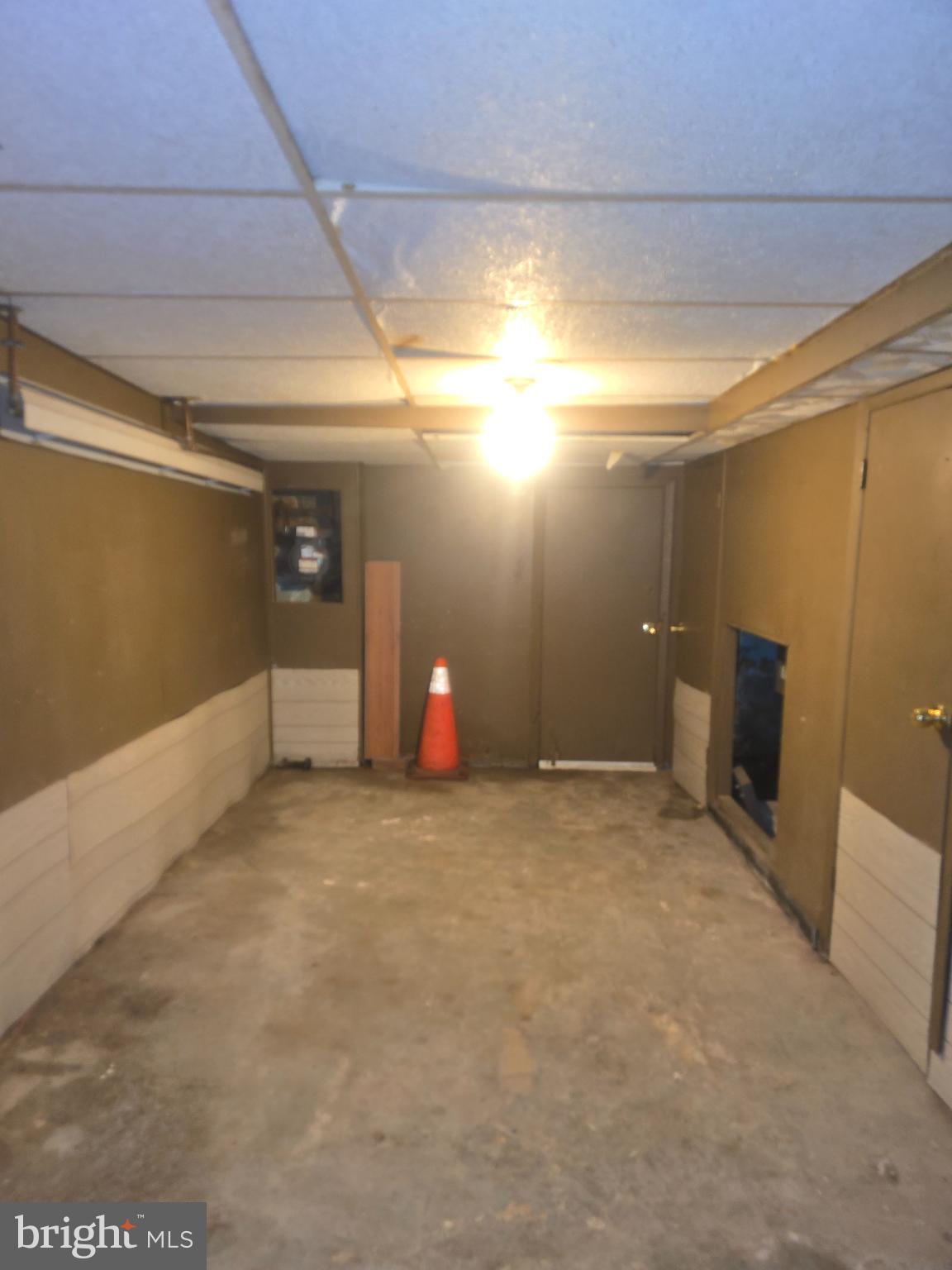 556 North Wanamaker Street Philadelphia, PA 19131 - Photo 13 of 14 Spacious, versatile garage space awaits you.