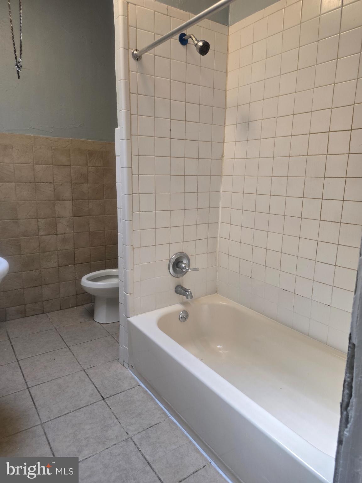 556 North Wanamaker Street Philadelphia, PA 19131 - Photo 10 of 14 Bright and functional bathroom space.