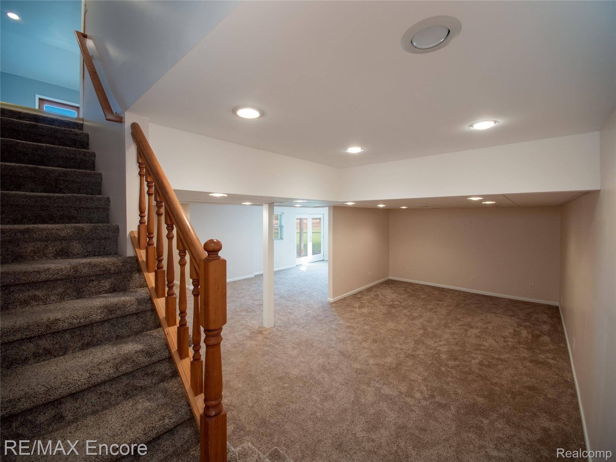 4815 Shoemaker Road Almont, MI 48003 - Photo 29 of 37 Entertain In Spacious Walkout Finished Basement