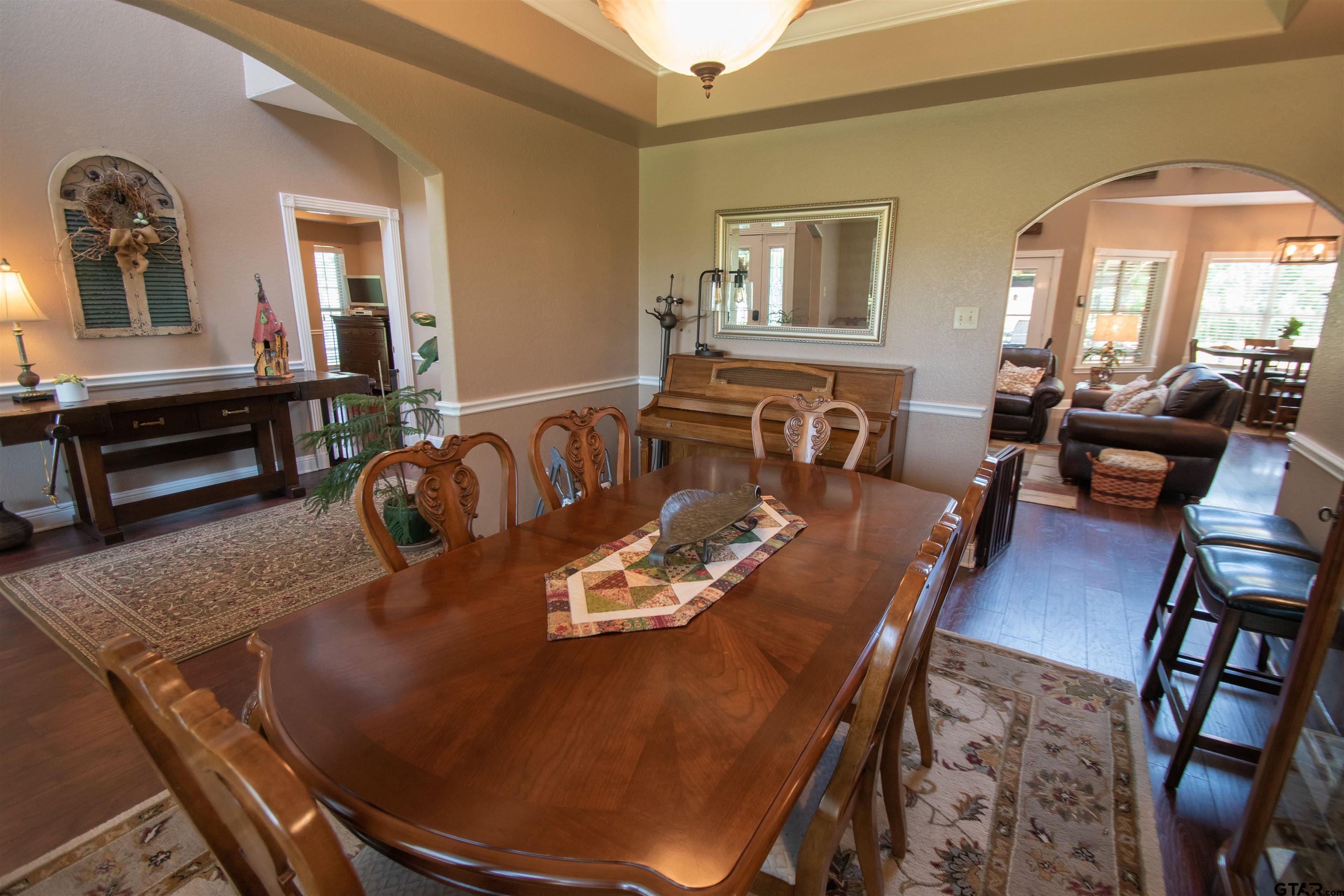 23120 Saddle Ridge Court Lindale, TX 75771 - Photo 9 of 34 a view of a dining room with furniture
