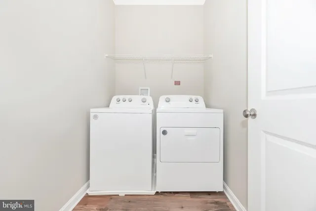 a view of an empty room with stairs