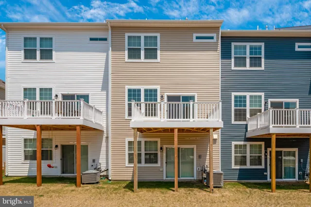 a front view of a building with street view