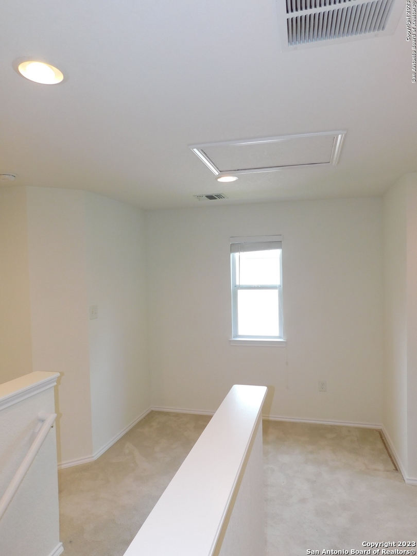 4302 Crystal Bay San Antonio, TX 78259 - Photo 11 of 32 a view of an empty room and a window