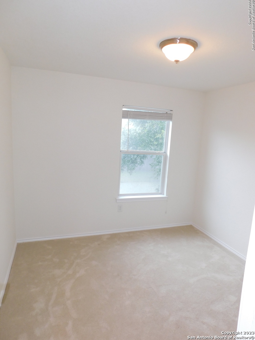 4302 Crystal Bay San Antonio, TX 78259 - Photo 16 of 32 an empty room with a window